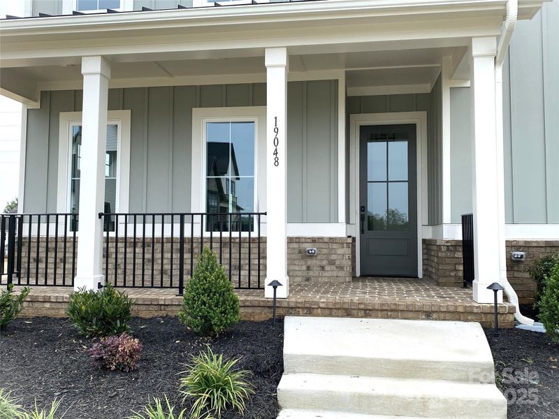 Front exterior of a new home in , Davidson, NC, highlighting curb appeal (Image 18).