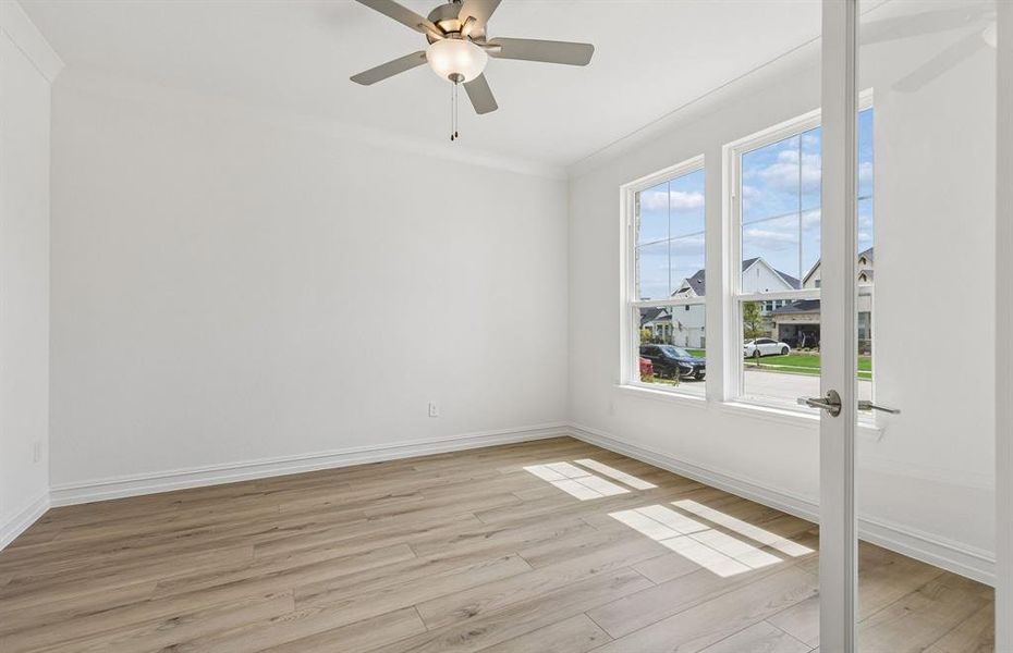 Office off home entry with large windows