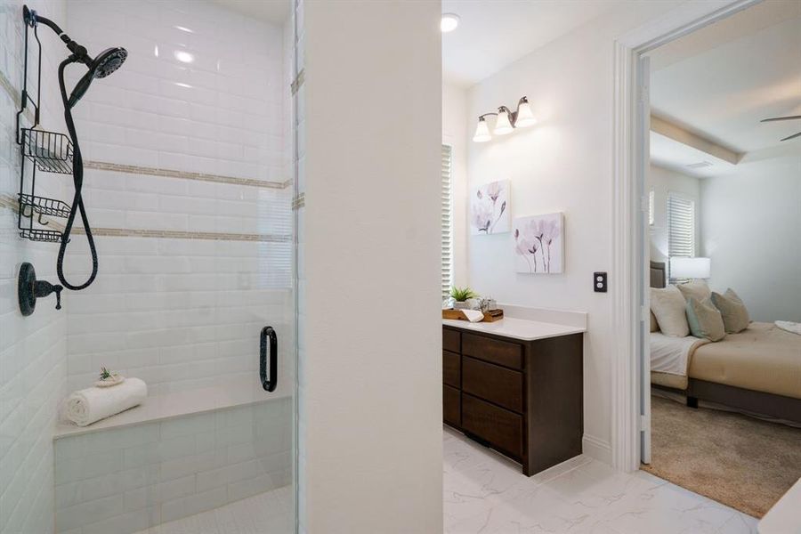 Enjoy extra room and a built-in bench in the spacious shower.