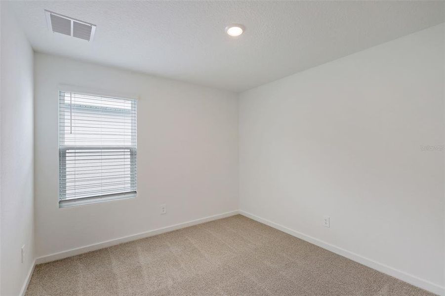 Spacious, unfurnished interior of a new home in Flagler Village - Classic Series, Palm Coast (Image 18).