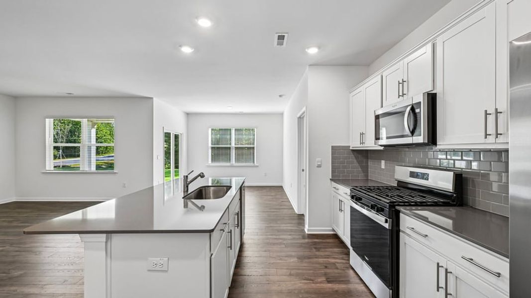 Furnished interior view inside a new home in The Villas at Laurel Oaks, Sanford (Image 9).