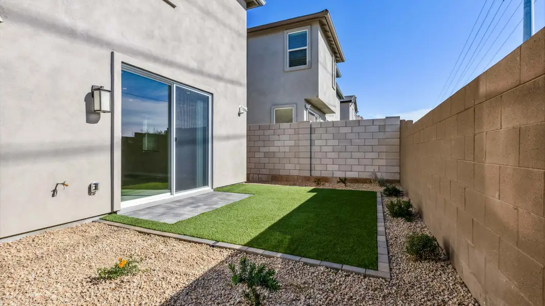 Exterior details and patio area of a home in Talinn Towns at Desert Ridge, Phoenix (Image 3).