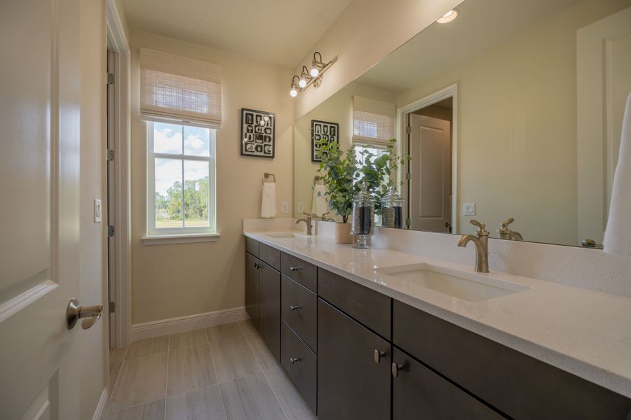 Representative furnished interior of a home built from the Ibis by Jones Homes USA in Legends Preserve, Daytona Beach (Image 16).
