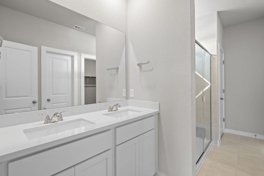 Primary Bath retreat with dual vanities & walk-in shower Primary Bath retreat with dual vanities & walk-in shower