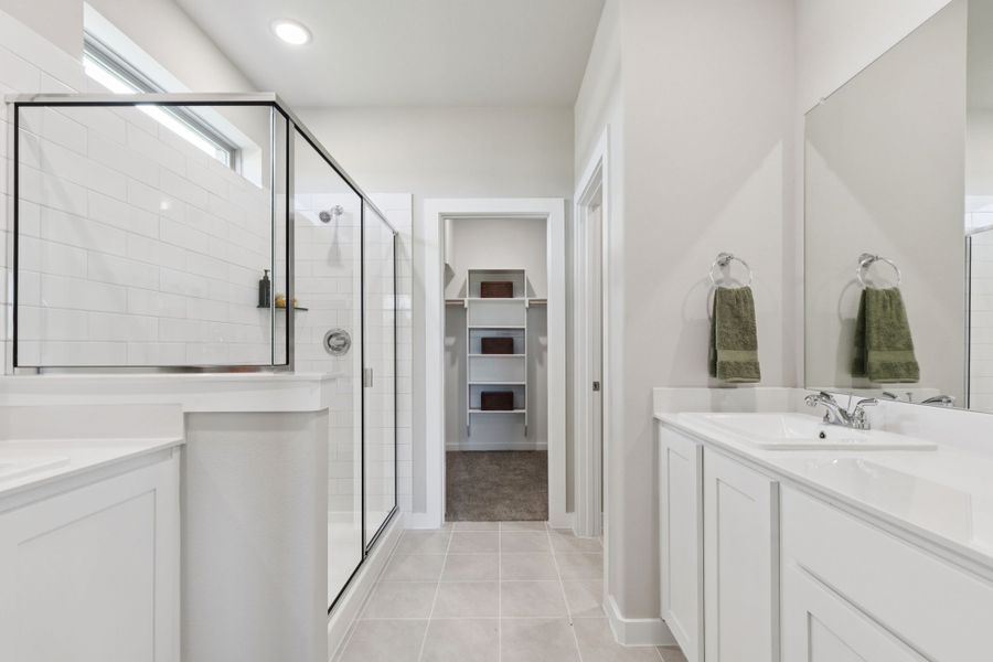 Primary Bathroom in the Magnolia home plan by Trophy Signature Homes – REPRESENTATIVE PHOTO