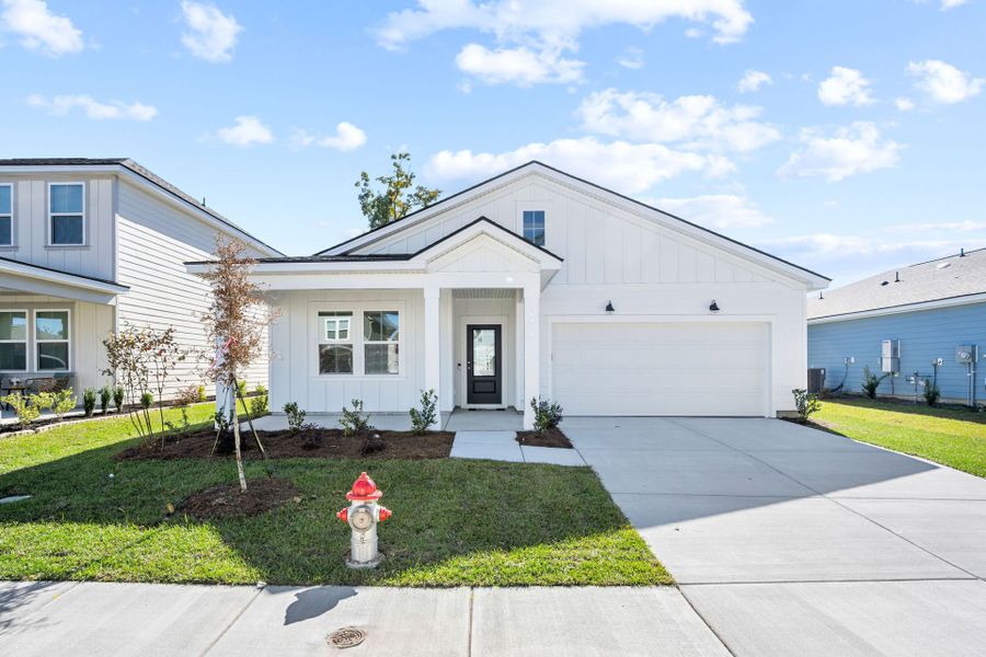 Front exterior of a new home in Salem Bay, Beaufort, SC, highlighting curb appeal (Image 1).