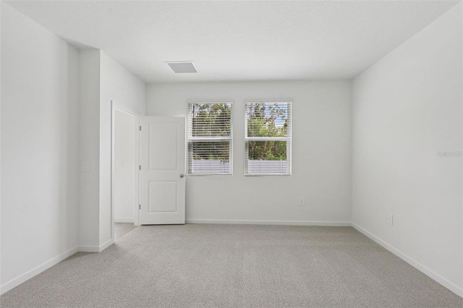 Spacious, unfurnished interior of a new home in Flagler Village - Classic Series, Palm Coast (Image 28).