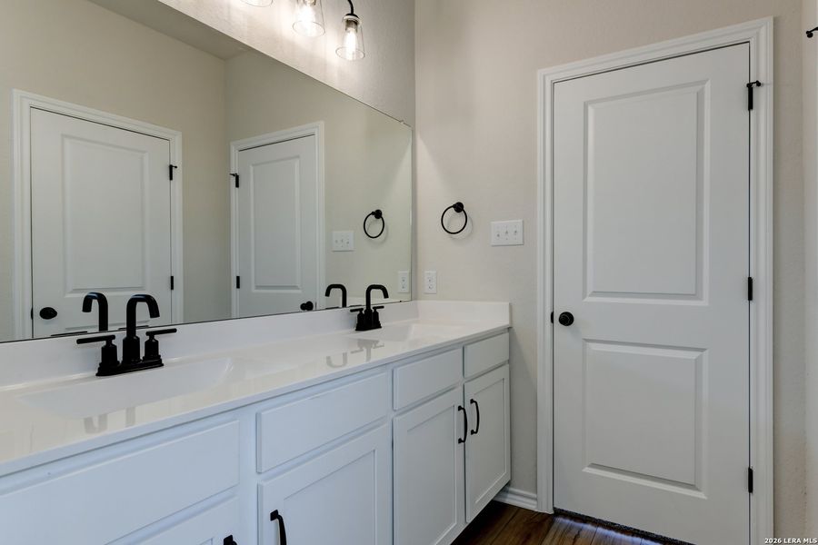 Furnished interior view inside a new home in Hennersby Hollow, San Antonio (Image 10).