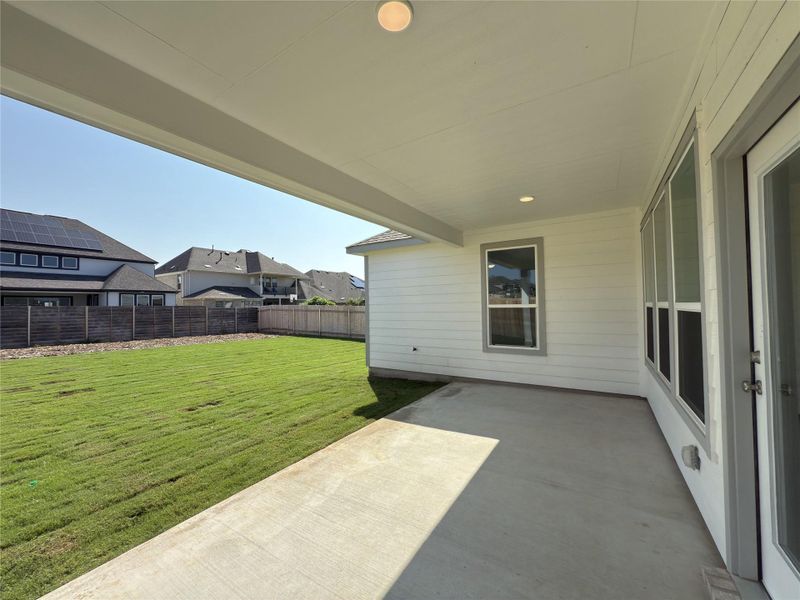 Front exterior of a new home in River Bluff, Leander, TX, highlighting curb appeal (Image 20). Front exterior of a new home in River Bluff, Leander, TX, highlighting curb appeal (Image 20).