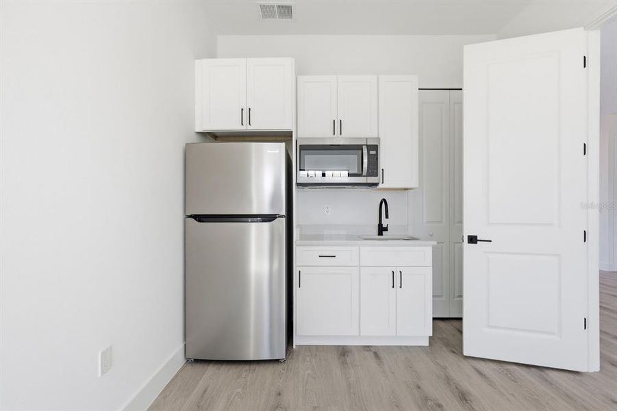 Furnished interior view inside a new home in , Ocala (Image 13).