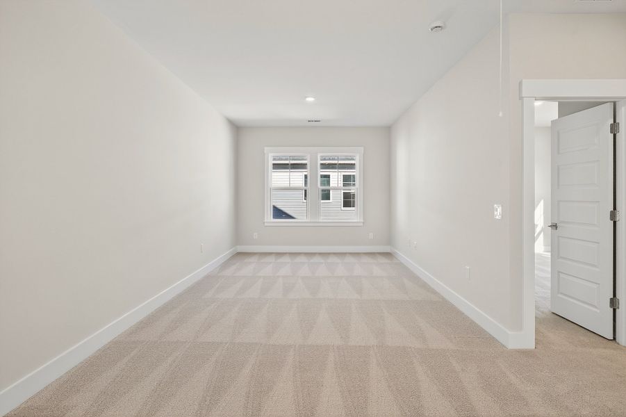 Representative unfurnished interior of a home built from the Church Hill by Hunter Quinn Homes in Huckleberry Estates, Conway (Image 32).