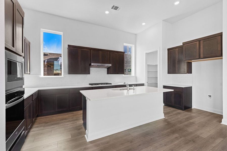 Furnished interior view inside a new home in The Colony - 50', Bastrop (Image 11).