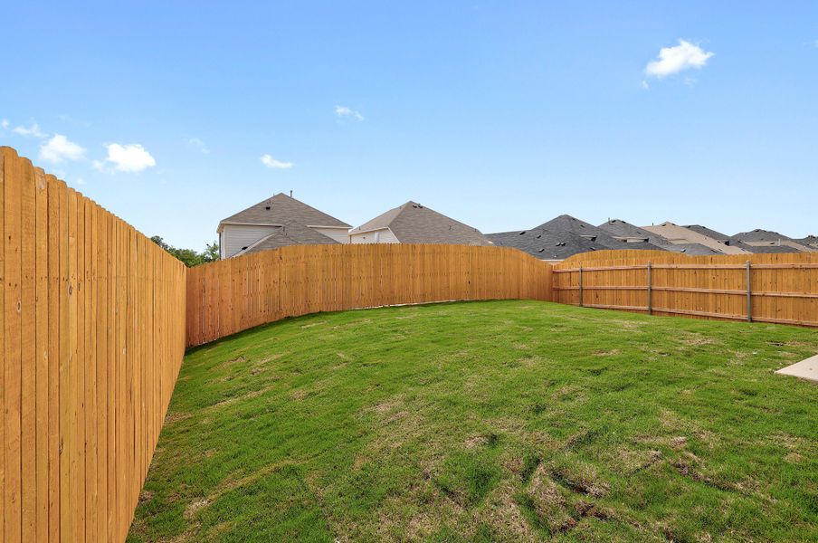 Exterior details and patio area of a home in Trinity Ranch, Elgin (Image 20).