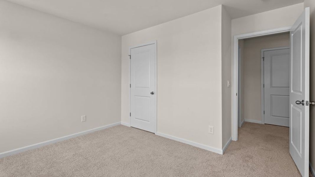 Spacious, unfurnished interior of a new home in Hobbs Farm, Ayden (Image 24).