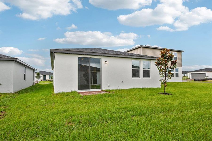Exterior details and patio area of a home in Hamilton Bluff - Classic Series, Lake Hamilton (Image 17).