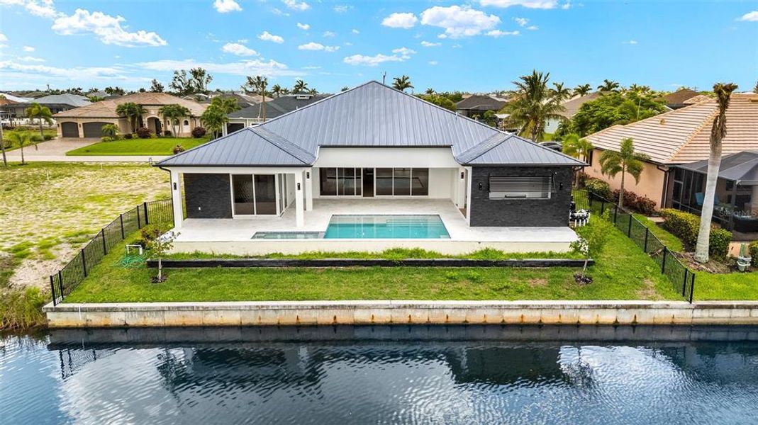 Front exterior of a new home in , Cape Coral, FL, highlighting curb appeal (Image 30). Front exterior of a new home in , Cape Coral, FL, highlighting curb appeal (Image 30).