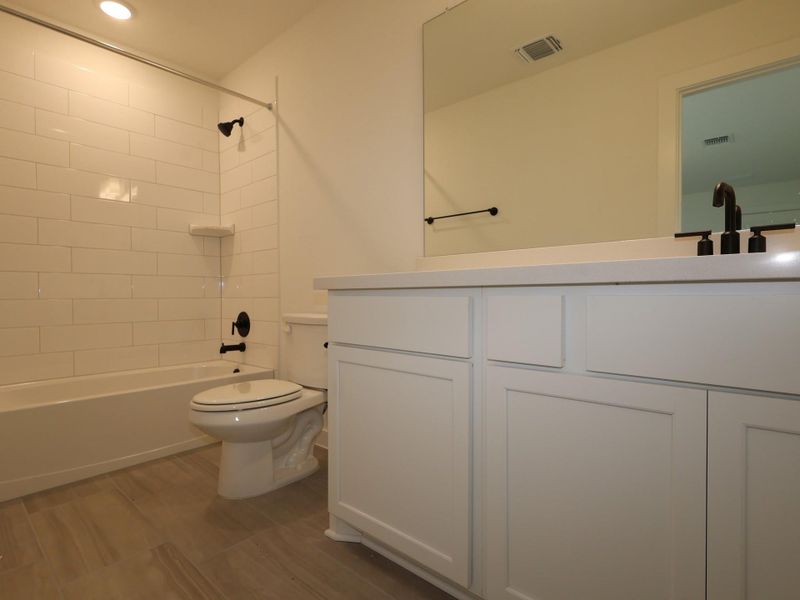 Furnished interior view inside a new home in Barksdale, Leander (Image 11). Furnished interior view inside a new home in Barksdale, Leander (Image 11).