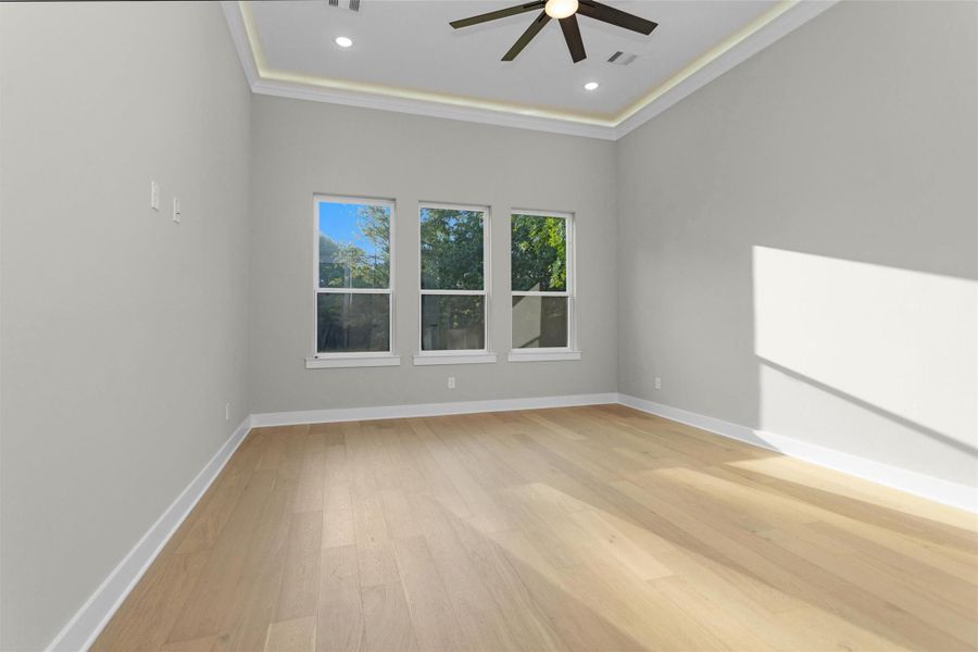 Generously sized owner’s retreat with large windows and space for a sitting area. Generously sized owner’s retreat with large windows and space for a sitting area.