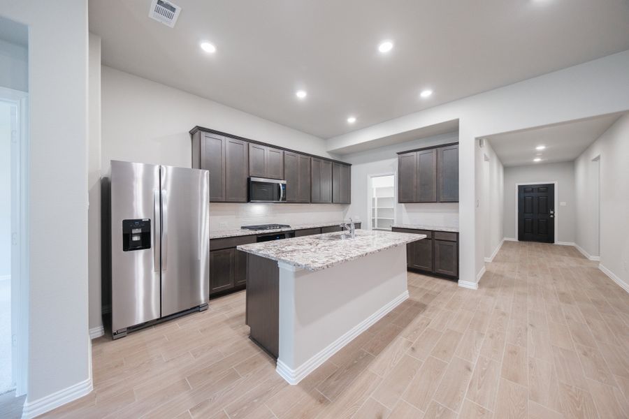 Furnished interior view inside a new home in The Villages of Hurricane Creek, Anna (Image 8).