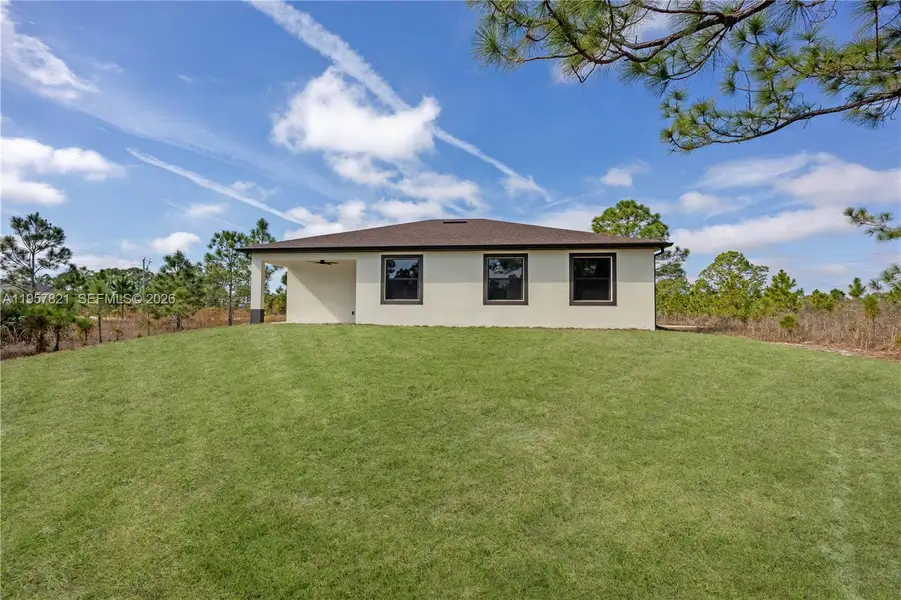 Exterior details and patio area of a home in , Lehigh Acres (Image 3).