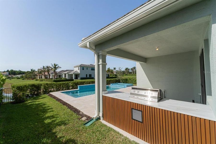 Exterior details and patio area of a home in Tesoro Club, Port St. Lucie (Image 28).