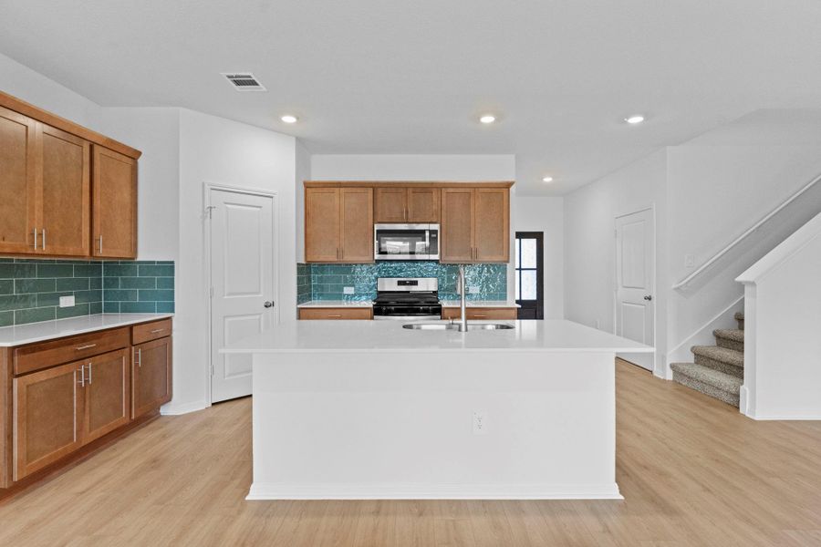 Furnished interior view inside a new home in Bar W Ranch, Leander (Image 13).