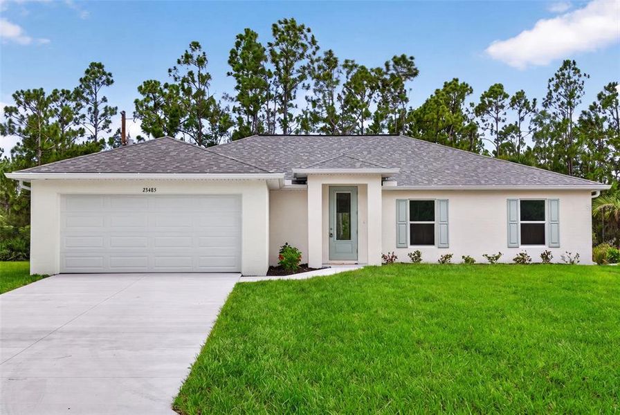 Front exterior of a new home in , Port Charlotte, FL, highlighting curb appeal (Image 1). Front exterior of a new home in , Port Charlotte, FL, highlighting curb appeal (Image 1).