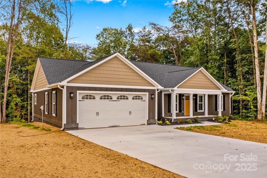 Front exterior of a new home in , Statesville, NC, highlighting curb appeal (Image 1). Front exterior of a new home in , Statesville, NC, highlighting curb appeal (Image 1).