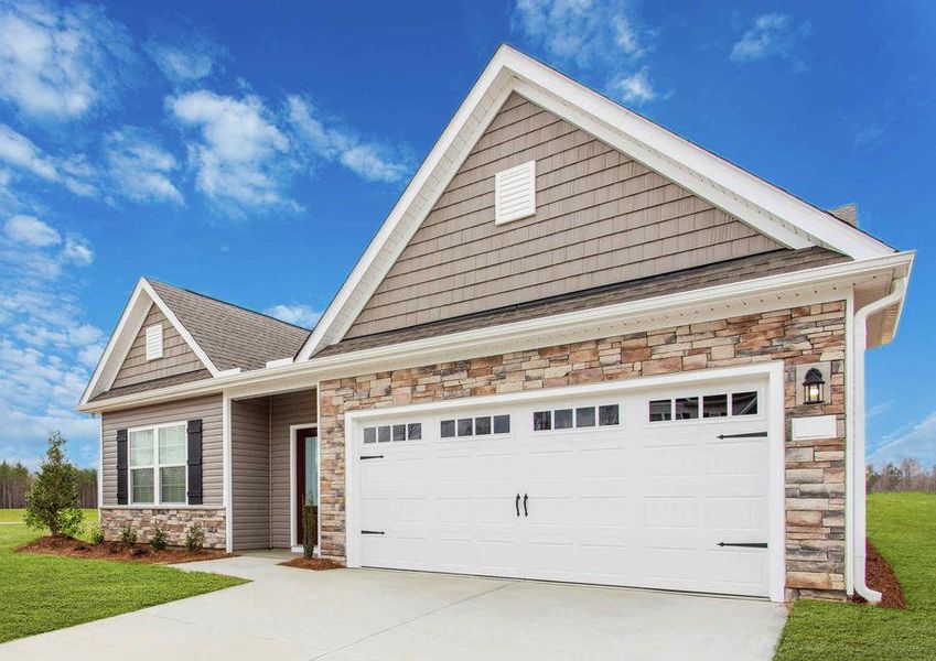 Allatoona house front with dual-car garage, green grass, and driveway