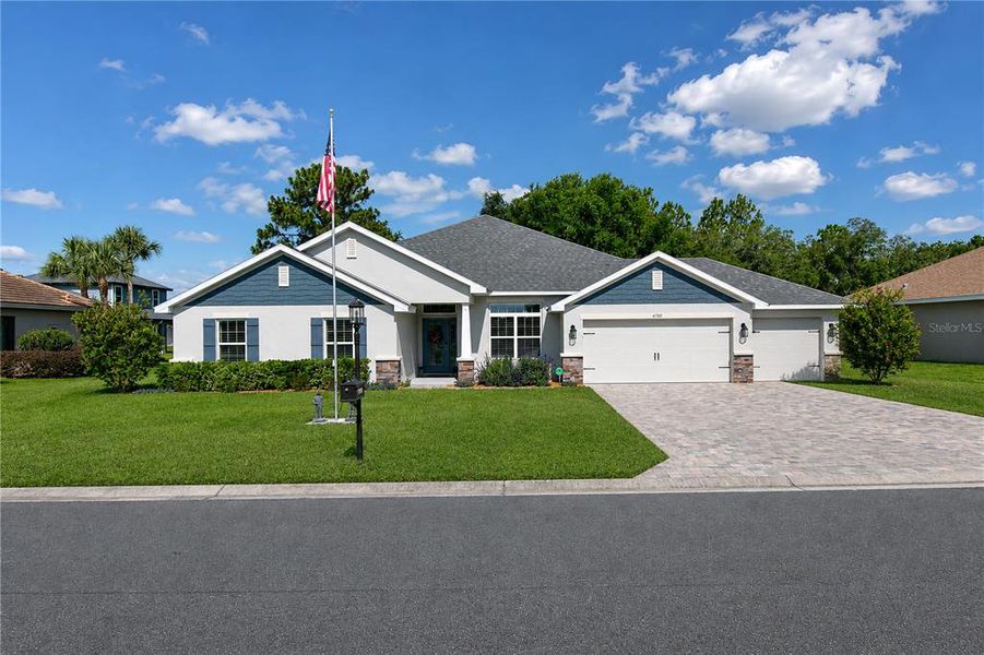 Front exterior of a new home in , Dunnellon, FL, highlighting curb appeal (Image 26).