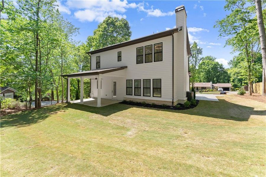Exterior details and patio area of a home in , Flowery Branch (Image 25).