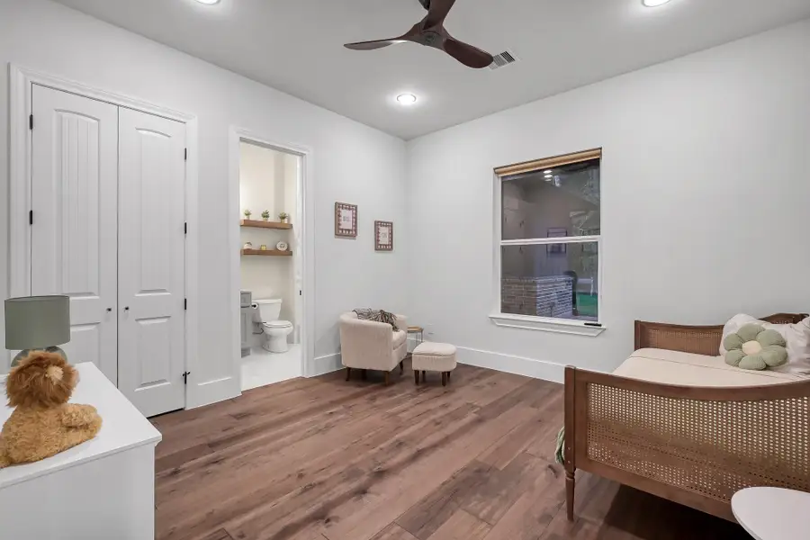 The neutral tones and modern fixtures create a relaxing, upscale atmosphere.