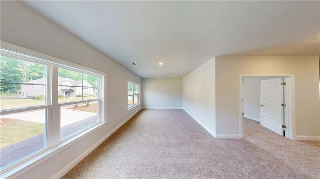 Spacious, unfurnished interior of a new home in Mirror Lake at South Harbour, Villa Rica (Image 31).