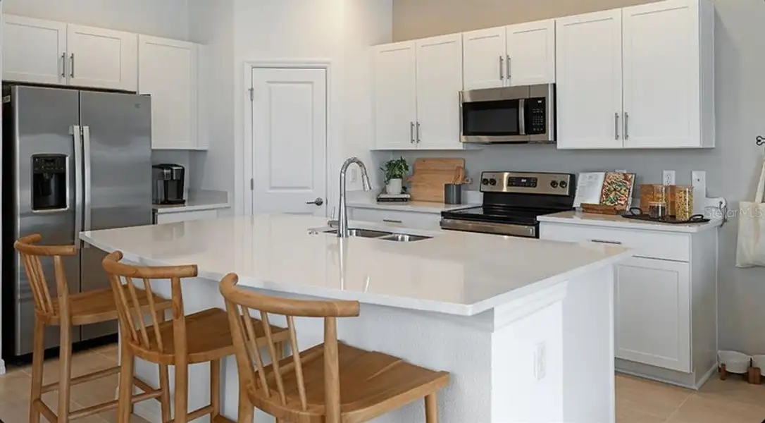 Furnished interior view inside a new home in Vinterra Townhomes, Nokomis (Image 3).