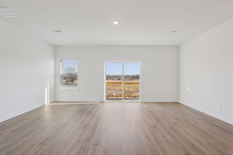 Spacious, unfurnished interior of a new home in Greystone - Highland Townhomes, Smyrna (Image 12).
