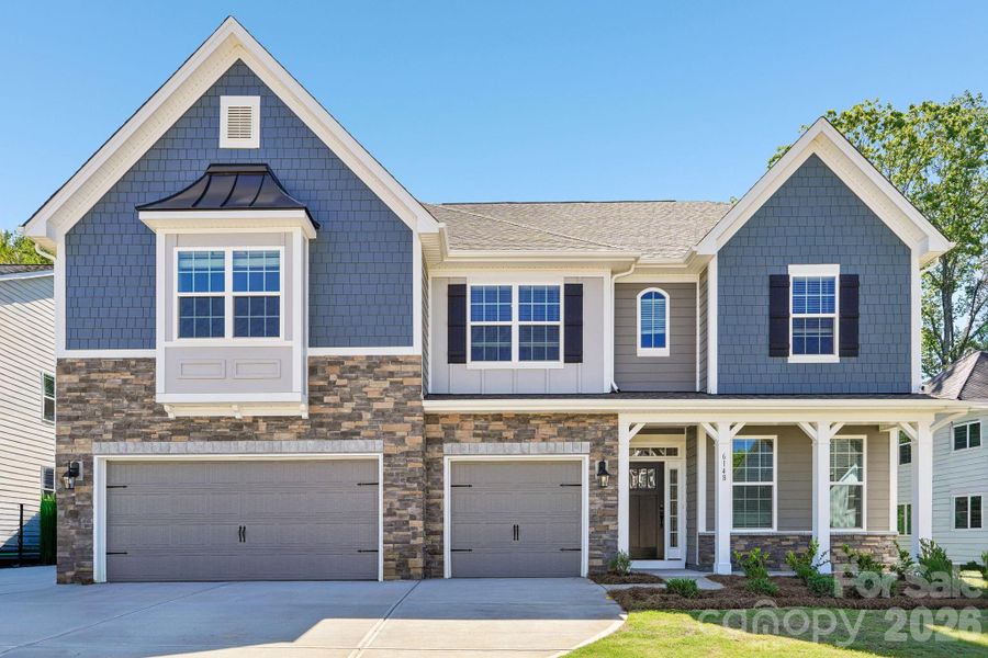 Front exterior of a new home in Sylvan Creek, Denver, NC, highlighting curb appeal (Image 1). Front exterior of a new home in Sylvan Creek, Denver, NC, highlighting curb appeal (Image 1).