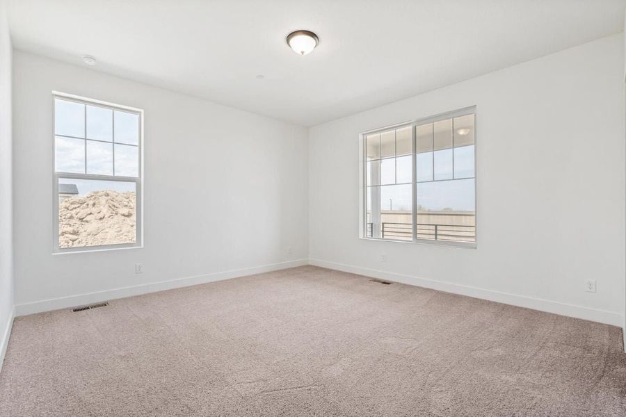 Spacious, unfurnished interior of a new home in The Nest Reserve at Canyon Creek, Erie (Image 17).
