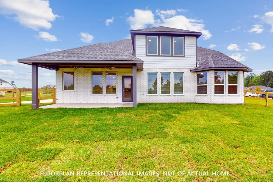 Exterior details and patio area of a home in Lone Star Landing, Montgomery (Image 3). Exterior details and patio area of a home in Lone Star Landing, Montgomery (Image 3).