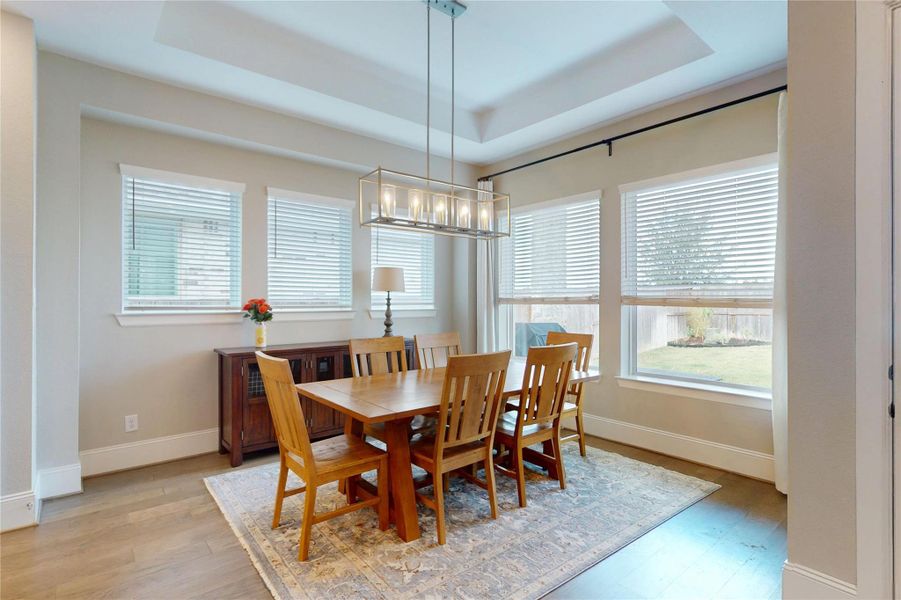Well lighted corner dining area.