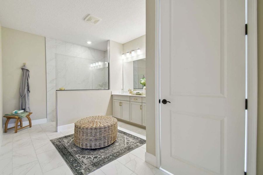 Furnished interior view inside a new home in The Sanctuary – Royal Collection, Punta Gorda (Image 30).