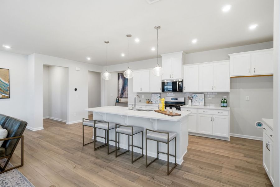 Furnished interior view inside a new home in Waxhaw Landing, Monroe (Image 6).