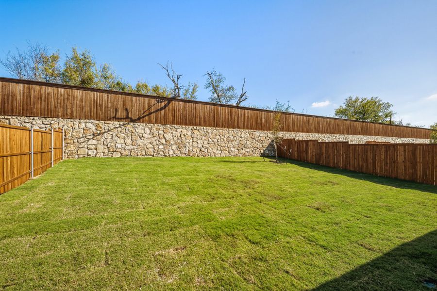 Exterior details and patio area of a home in Wildflower Ranch, Fort Worth (Image 3).
