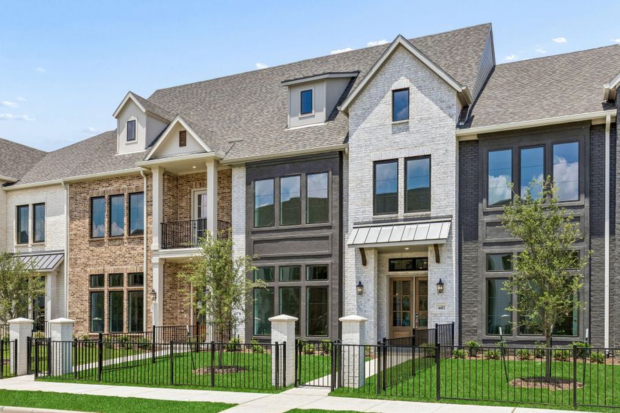 Front exterior of a new home in Newman Village Townhomes, Frisco, TX, highlighting curb appeal (Image 2). Front exterior of a new home in Newman Village Townhomes, Frisco, TX, highlighting curb appeal (Image 2).
