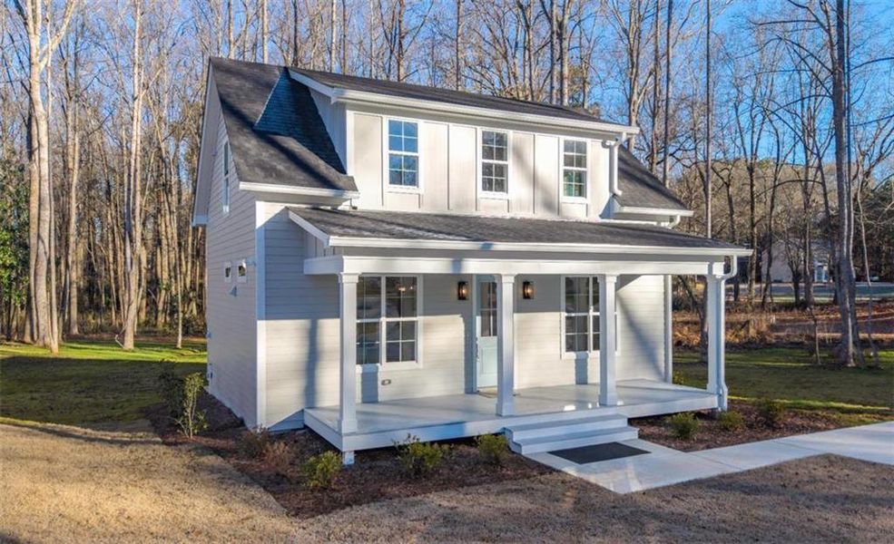 Front exterior of a new home in , Bowdon, GA, highlighting curb appeal (Image 1). Front exterior of a new home in , Bowdon, GA, highlighting curb appeal (Image 1).