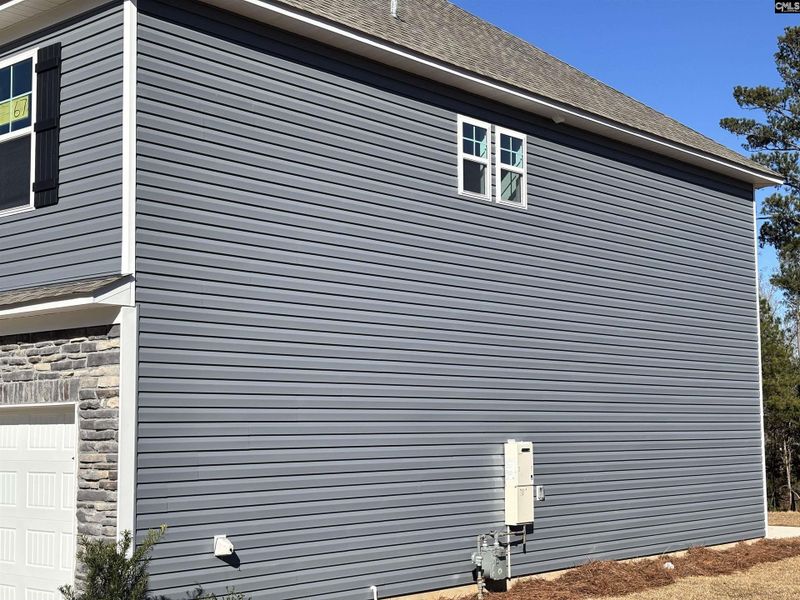 Exterior details and patio area of a home in Rolling Hills, Prosperity (Image 2). Exterior details and patio area of a home in Rolling Hills, Prosperity (Image 2).