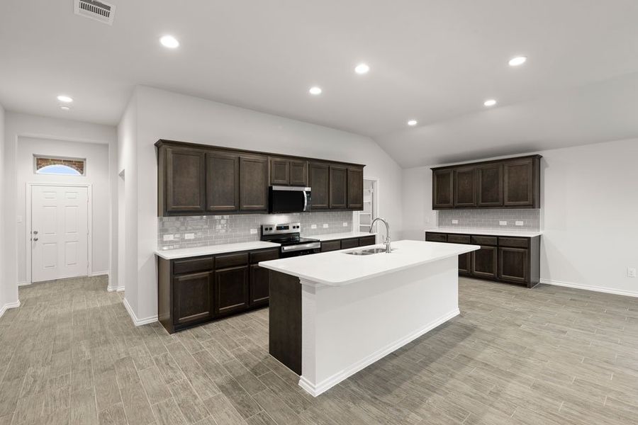 Representative exterior photo of a completed home built from the Lincoln by Impression Homes in DeBerry Reserve, Royse City, TX (Image 6).