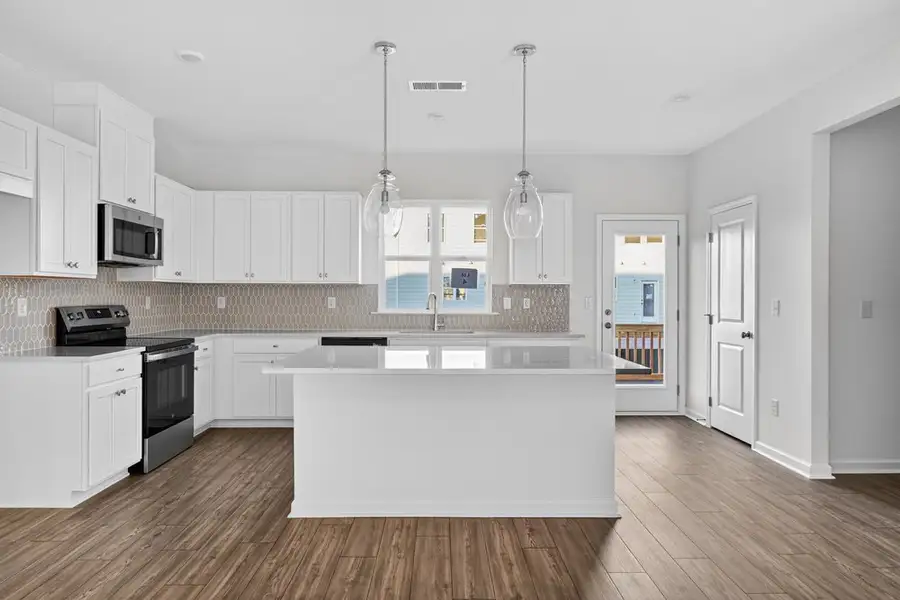 Furnished interior view inside a new home in Chandler Run, Tucker (Image 4).