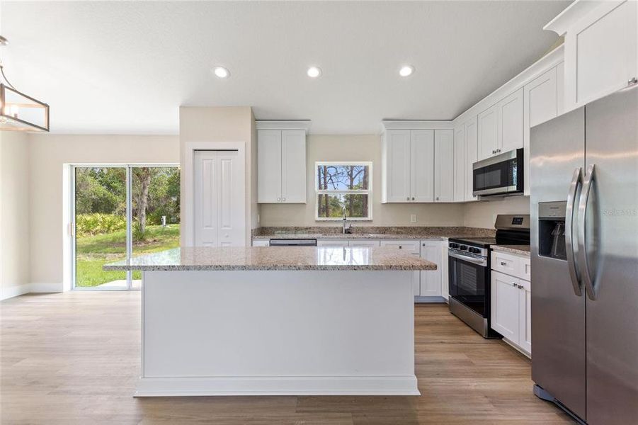 Furnished interior view inside a new home in , Indian Lake Estates (Image 8).
