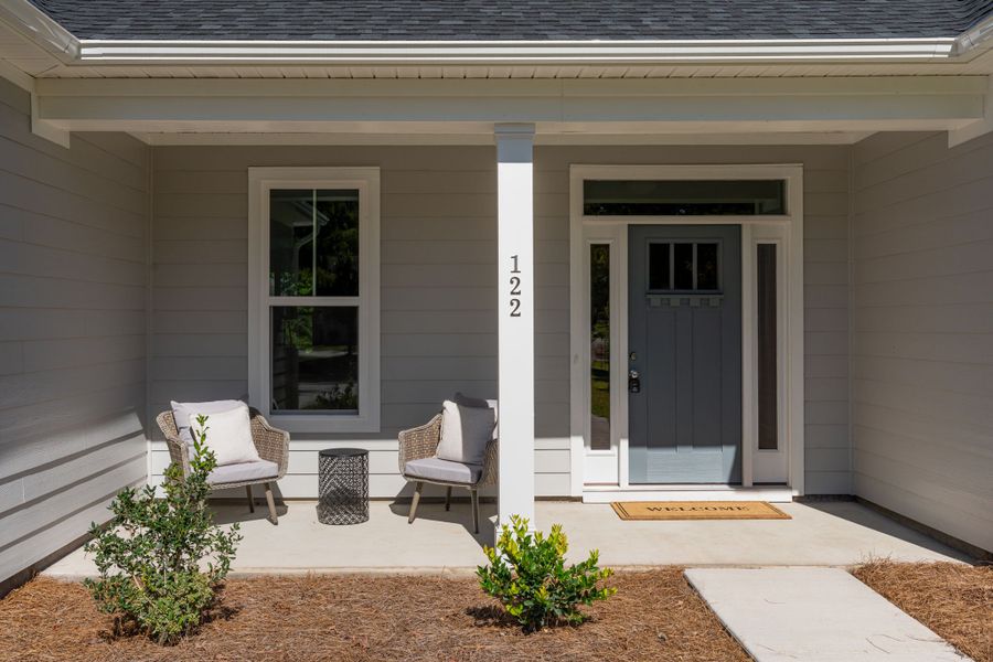 Exterior details and patio area of a home in The Bluffs at Lake Waccamaw, Lake Waccamaw (Image 24).