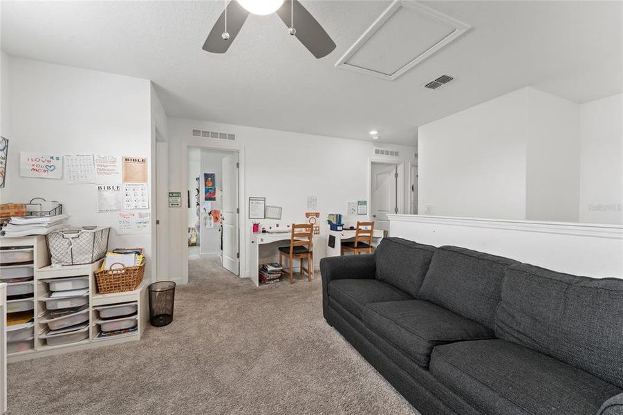 Furnished interior view inside a new home in Storey Park: Innovation Manor Collection, Orlando (Image 10).